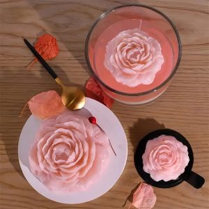 Scented peony flower candles in large, medium, and small sizes.